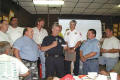 Chief Gambrill presenting the check to Chief Prateel